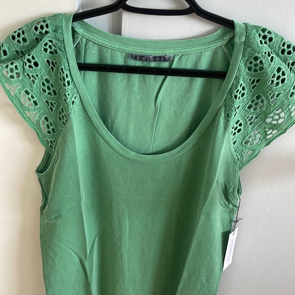 Nice casual top nice embroidery sleeves colors is like a faded green